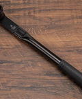 Bottom Bracket Removal Tool For Cartridge Type 20 Tooth Splined Systems Pro Grade with long handle on wooden surface