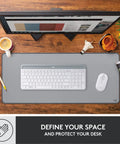 Studio Series Desk Mat Large Extended Desk Pad With Anti Slip Base Spill Resistant Durable Design Soft Cloth Surface Protects Your Desk For Home Office And Workstation Mid Gray shown with keyboard and mouse