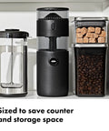 Compact Stainless Steel Conical Burr Electric Coffee Bean Grinder Delivers Smooth Daily Brews With Fine To Coarse Grinds For A Solid Daily Driver Fit That Works In Tight Spaces on a kitchen shelf.