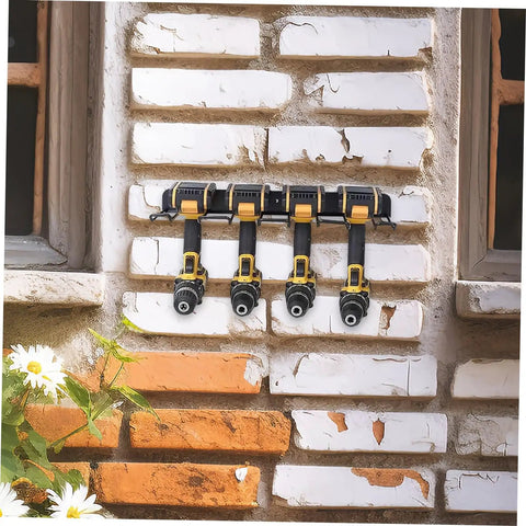 Heavy Duty Wall Mounted Power Tool Holder With Rock Solid Steel Garage Storage Rack For Drills And Hand Tools holding four drills on a wall.