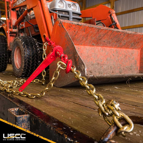 Ten Pack Ratchet Chain Binders for Secure Tie Downs, fits one quarter inch Grade 70 and five sixteenth inch Grade 43 chain, 3150 lbs working load limit, red finish, two grab hooks per binder securing tractor on flatbed