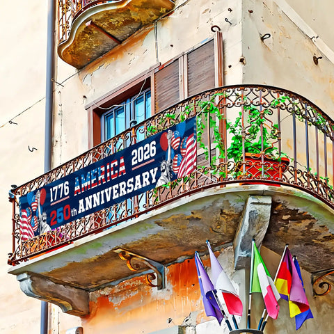 250th Anniversary American Banner Flag 1776 2026 Patriotic Decor on balcony with iron railing, visible flags below.