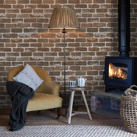 Cozy living room with vintage brown brick peel and stick wallpaper removable faux 3D brick for walls and fireplace easy install no glue required self adhesive PVC eco friendly repositionable 17.7 inch by 197 inch roll 24.27 sq ft.