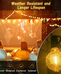 Lit 196ft Outdoor Globe LED String Lights Warm White Shatterproof Bulbs Waterproof shown in a party setting