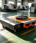 Heavy Hitting Electric Transfer Cart Built To Crush Daily Grind With Smart Remote Control on factory floor, showcasing its trackless design.