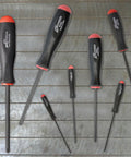 7 Piece Balldriver Screwdriver Set With ProGuard Finish And ComfortGrip Handles lying on wooden surface, sizes 1.27 to 5 mm