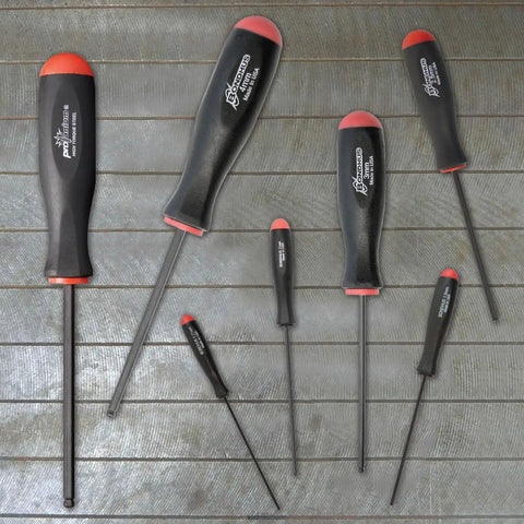 7 Piece Balldriver Screwdriver Set With ProGuard Finish And ComfortGrip Handles lying on wooden surface, sizes 1.27 to 5 mm