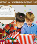 Children unwrapping gift with Acrylic Periodic Table With 83 Real Elements, Warm LED Light, USB Powered Wooden Display Stand