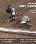7 Foot Stainless Steel Sliding Door Hardware Kit For Single Wooden Door Top Mount Track System Fits 42 Inch Wide Panels T Style Rail Easy Install Heavy Duty Smooth Quiet Operation Rust Proof And Waterproof, showing stainless steel components on a wooden surface.