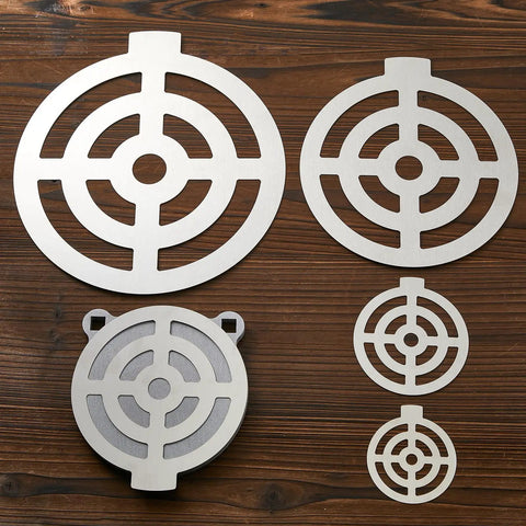 Five Piece AR500 Steel Target Set For Shooting, 3, 4, 6, 8, And 10 Inches Gong Targets on wooden surface