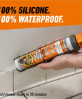 Side view of Gorilla 100% silicone sealant cartridge, 10 oz, clear, held in hand for caulking.