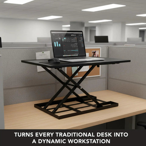32 By 22 Inch Standing Desk Converter With Gas Spring Lift Slim Two And A Half Inch Low Profile Sit Stand Desk Riser in an office