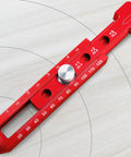 Tough As Nails Aluminum Woodworking Compass Scriber Smooth Operator on wood surface with metric and inch measurements.