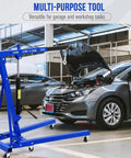 2 Ton Folding Engine Hoist With 4400 Lb Hydraulic Capacity, Heavy Duty Cherry Picker in garage lifting an engine.