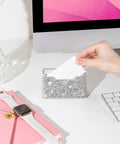 Hand placing card into Blinged Out Business Card Holder Stand For Desk And Office, Crystal Rhinestones, White Glitter Display