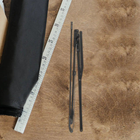 Two Piece Heavy Duty Steel Folding Umbrella Repair Kit Eight Bone Replacement Parts, steel ribs and pole on wooden surface.