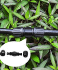 Half Inch Drip Irrigation Fittings Barbed Elbow Connectors Six Pack shown in black on green foliage, featuring leak resistant design.