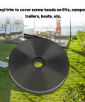 Front view of a 1-inch black vinyl trim molding screw-cover roll, 100 ft for RVs and trailers