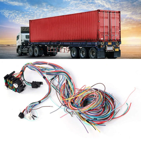 12V Universal Fuse Harness Kit With 21 Circuit Color Coded Wires for Cars Trucks RVs and Motorhomes in front of a truck