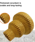 Two gold M10 thread diamond core stepped pagoda drill bits for metal, angled view