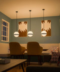 Pan 1 Light Pendant in black with round milk glass shade and black stripes for modern home lighting in dining area