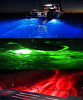 Lit RGBW Boat Drain Plug Lights illuminating water at night, blue, green, and red colors, IP68, app and RF controlled.