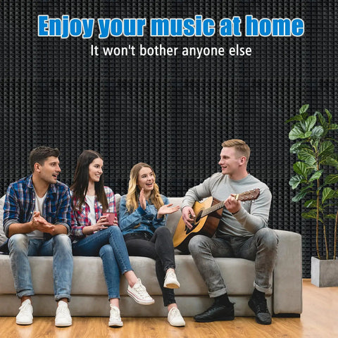 High Density Pyramid Acoustic Foam Panels 4 Pack 48 X 24 X 2 Inch Flame Retardant Sound Absorbing Studio Foam in a cozy music setting.
