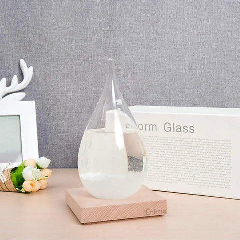 Storm Glass Weather Predictor With Wood Base Modern Weather Station Crystal Glass Bottle For Home Or Office Decor Predict Weather By Crystal Formations Dope Desk Accessory And Conversation Starter on a desk setting