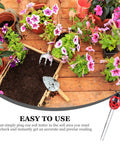 Garden scene with a 3 In 1 Ladybug Soil Tester Kit for Garden and Lawn Soil pH Moisture and Nutrient Checker among flowers and tools