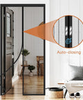 Heavy Duty Screen Door Mesh For 32x80 Inch Openings Keeps Bugs Out Hands Free For Interior Sliding Doors And Patio Black 34x82 Inch With Reinforced Edges Durable Material Easy Install And Quick Setup For Mosquito Prevention visible in interior setting with auto-closing feature highlighted