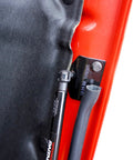 Close-up of Hood Quicklift Kit For Jeep Wrangler JL 2018 And Gladiator 2020 Plus Aluminum Hood Support System attached to red hood