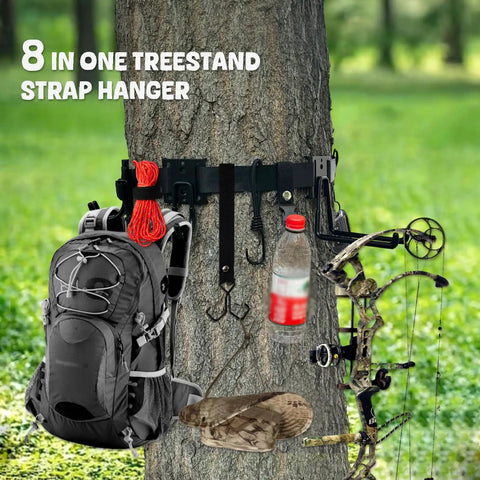8 In 1 Strap Hangers Kit With Bow Hanger And Multi Hook Gear attached to tree, holding backpack, bow, and bottle.