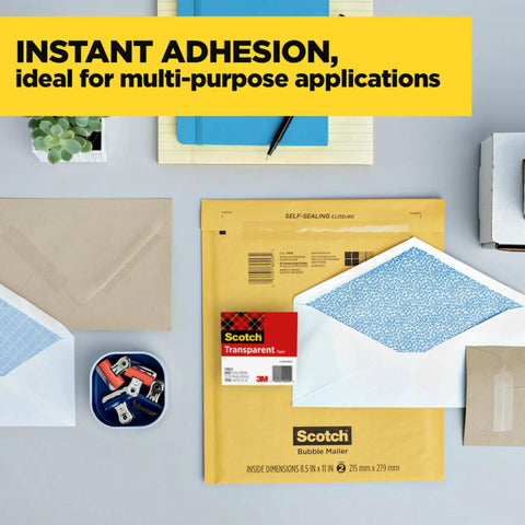 Office supplies including envelopes and tape, showcasing Crystal Clear Office Tape That Sticks Like A Pro, Three Quarters Inch Wide.