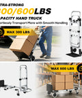 Heavy Duty 3 In 1 Convertible Hand Truck Dolly With 600 Pound Capacity, transporting boxes on a concrete surface.