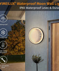 Moonlit Outdoor Wall Light 15.8 Inch Round Modern LED Exterior Waterproof Sconce mounted on a house wall during rain