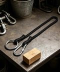 Ranch Tough Horse Stall Gate Latch With Twist Lock And Secure Barn Door Fastener designed for livestock enclosures on a workbench.