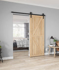 Beefy Heavy Duty Sliding Barn Door Hardware Kit for 6ft Single Door, wood door with black J shape hangers installed in living room
