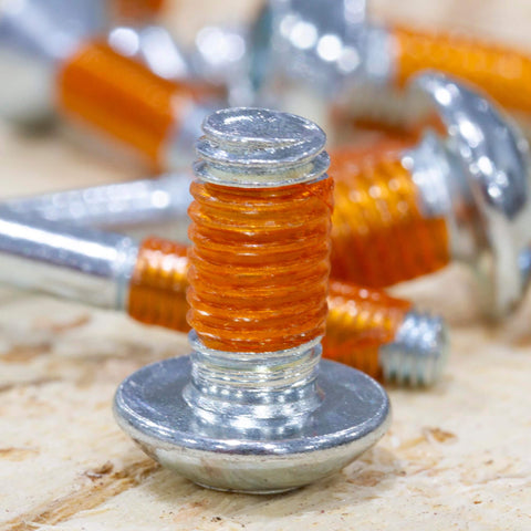 Instant Threadlocker Tape That Lets You Adjust, Remove, And Reuse Fasteners With No Cure Time - Locks Under Vibration Yet Breaks Free With Hand Tools, Works On Nearly Any Substrate, 0.625 In W By 60 In L applied on bolt, close-up view.