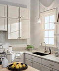 Kitchen with Winslow 7.5 Inch Mini Kitchen Pendant Light With Clear Seeded Glass In Brushed Nickel 1 Light hanging near window.
