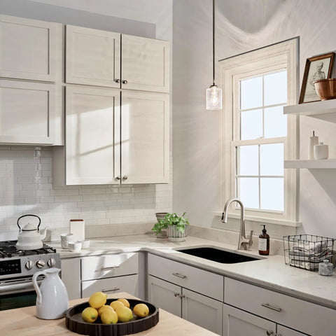 Kitchen with Winslow 7.5 Inch Mini Kitchen Pendant Light With Clear Seeded Glass In Brushed Nickel 1 Light hanging near window.