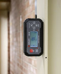 Precision Digital Level And Angle Gauge Finder With Bullseye Display Zero Offset Setup Dual Axis Calibration Audible Alert Magnetic Mount For Workshops mounted on a wall showing 89.9 degrees.