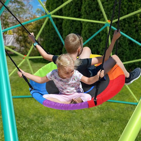 Children on saucer swing attached to Climbing Dome Swing Set With Saucer Swing For Kids Outdoor Backyard Playground 800 Pound Capacity Rust Resistant Easy Assembly Jungle Gym For Ages 3 8 12 Kid Tested Family Fun