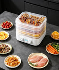 Sleek Digital Food Dehydrator With Adjustable Temperature And Timer For Fruits Veggies Meat Heavy Duty Electric Dryer To Whip Up Healthier Homemade Snacks No Brainer Four To Seven Tray Setup with stacked trays of dried fruits and meats.