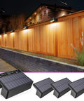 12 Pack Solar Deck Lights Outdoor Waterproof Step Fence Lighting With Warm White And Cool White LEDs illuminating a wooden fence