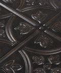 Close-up of embossed design on black tin wall tile, part of Tin Wall Tiles 24x24 Nail Up Black 5 Pack for Backsplash Ceiling and Stair Risers.