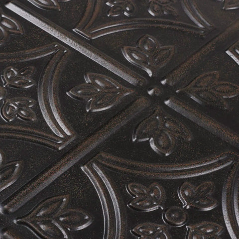 Close-up of embossed design on black tin wall tile, part of Tin Wall Tiles 24x24 Nail Up Black 5 Pack for Backsplash Ceiling and Stair Risers.