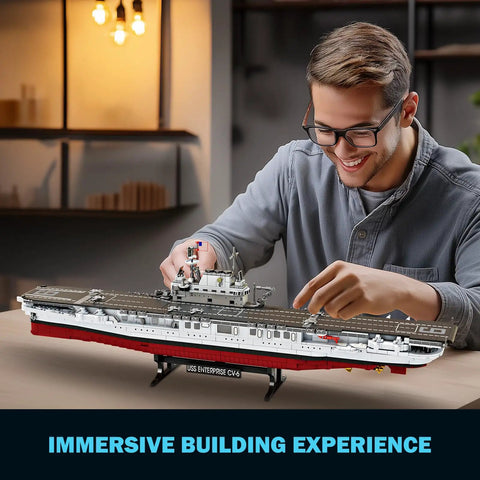 Man assembling Must Have Battleship Building Set For Adults And Teens 14 Plus Massive 1883 Piece USS CV 6 Enterprise Warship Kit