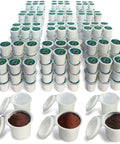 Assorted green K-Cup pods for Keurig brewers filled with coffee grounds, showcasing Custom Coffee Pods For K Cup Brewers Use Your Favorite Coffee Fits All K Cup Machines Save Hundreds Holds Fifty Percent More Coffee For Richer Or Larger Morning Brews On The Daily Commute Green.