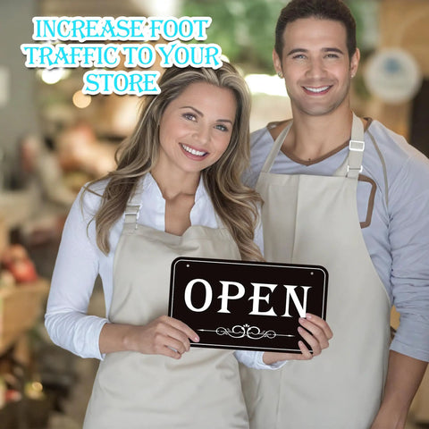 Owners holding Open Closed Sign For Biz 12x6.7 Inches Waterproof Double Sided Hanging Sign in store.