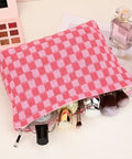Large Checkered Makeup Bag Canvas Cosmetic Organizer For Travel And Daily Use Rose Red Design Big Capacity Fits Makeup Brushes Lipsticks Eyeliners Creams Perfume And Toiletries Ideal Grab And Go Storage For Women, shown open with cosmetics.